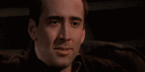 Nic Cage tries not to crack up, then LOLs uproariously