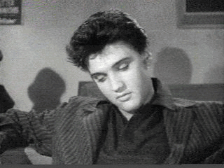 Oh yeah? Eye roll. Elvis looking dubious, via Reaction Gifs. 