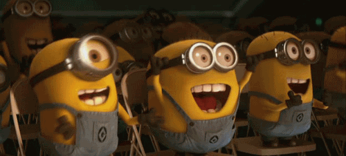Minions from Despicable Me clapping and cheering.
